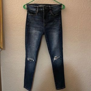 American eagle Skinny blue knee ripped jeans.